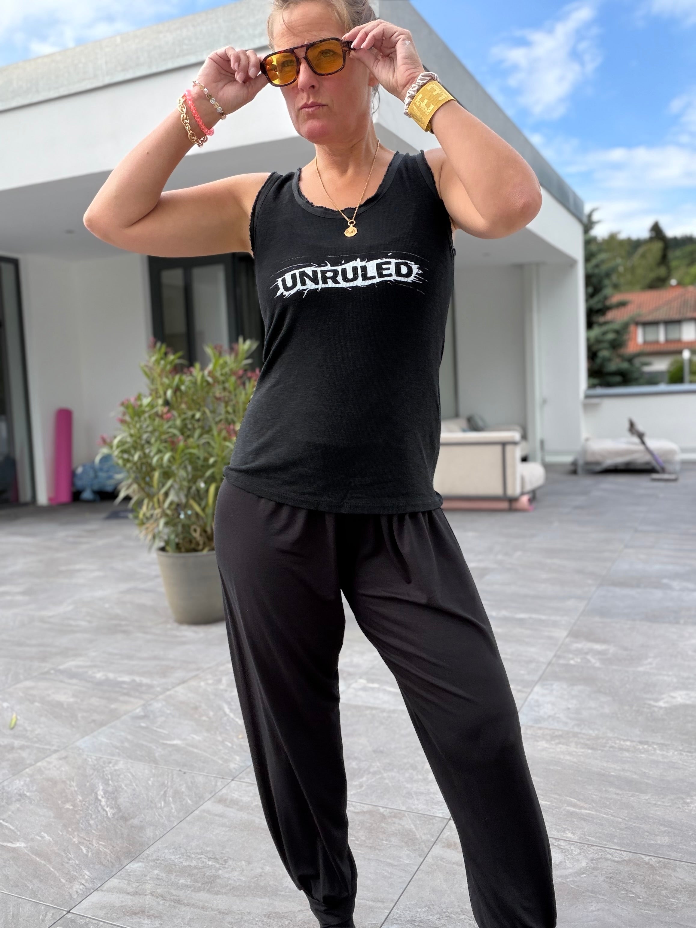 Top unruled, schwarz oder pink